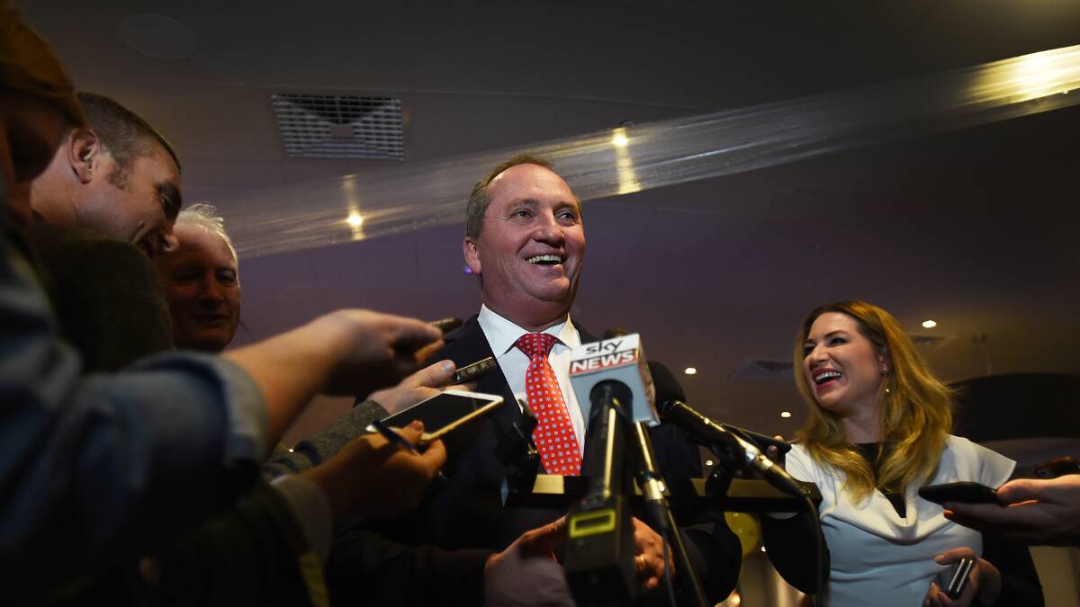 Barnaby Joyce and Vikki Campion moments after he won the 2016 New England election. Photo: Gareth Gardner