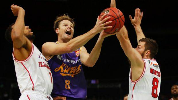 Congested: Brad Newley shoots for the Kings at Qudos Bank Arena Photo: AAP