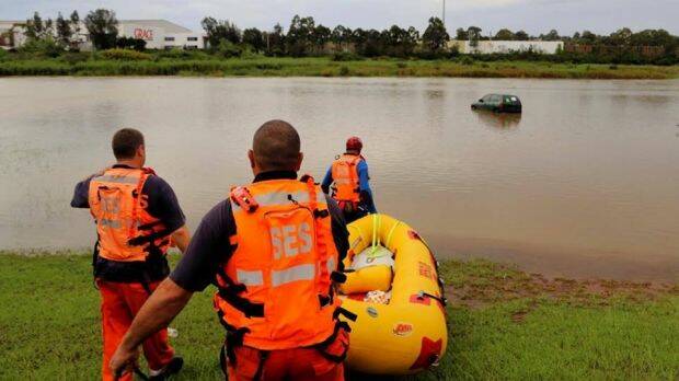 The NSW SES Parramatta unit retrieved an abandoned car from flood waters on Tuesday. Photo: NSW State Emergency Service