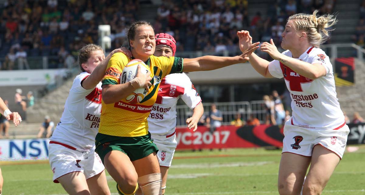 Out of our way: Jillaroos centre Isabelle Kelly goes for the line in Australia's 38-0 win over England on Sunday. Picture: John Veage