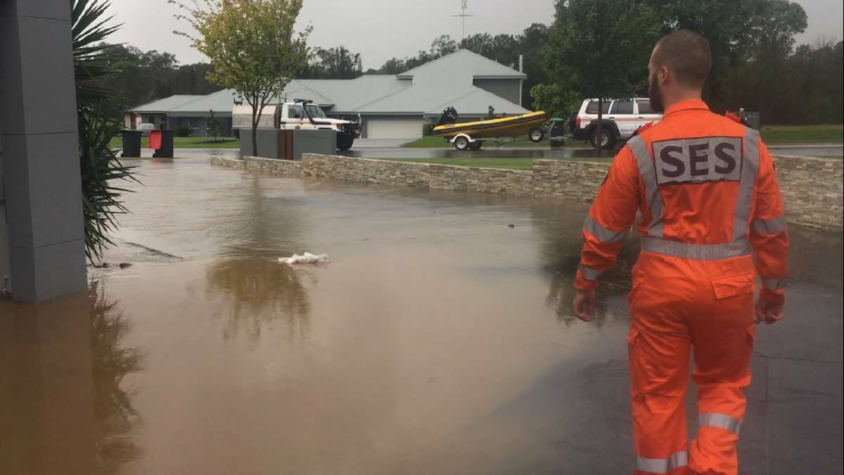 Penrith Rescue technician Andrew Bennet responds to the call regarding the flooded home at Luddenham. Picture: Penrith SES.