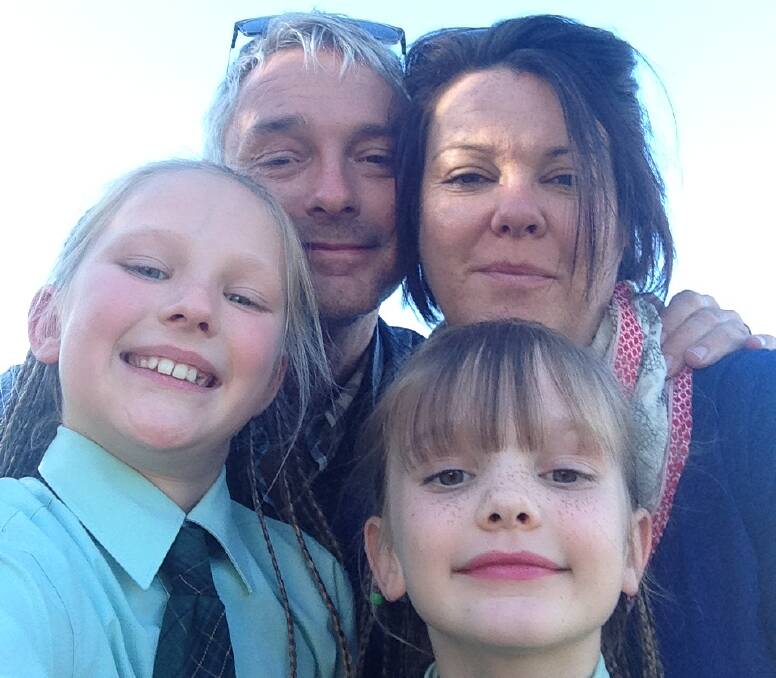 ASTRONAUTS: Adrian and Mel Parker with their daughters Helena, 9, and Arlia, 7. The family sent in a similar selfie when they entered the Blast Your Face Into Space competition.