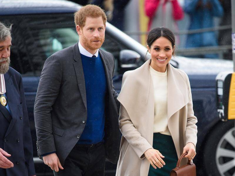 Prince Harry and his fiancee Meghan Markle have received a rapturous welcome from crowds in Belfast.