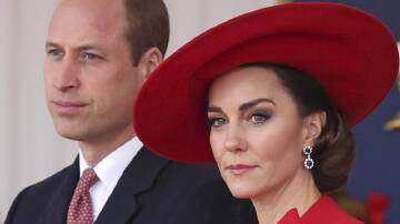 William has spent the past three-and-a-half weeks with Kate and their children. (AP PHOTO)
