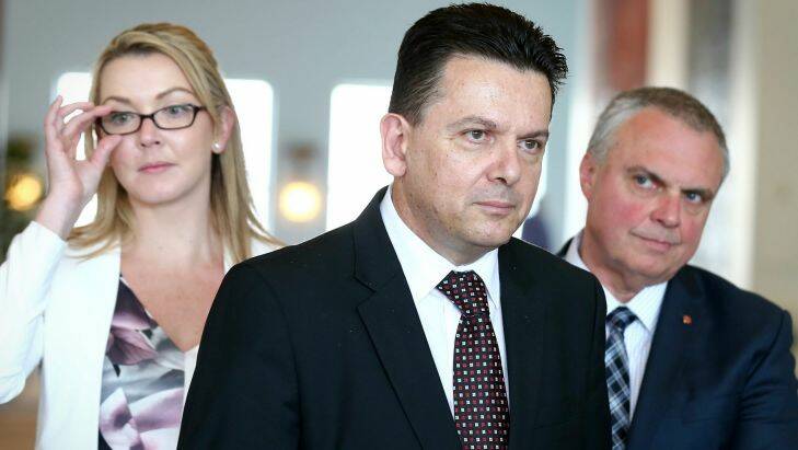NXT Senators Skye Kakoschke-Moore, Nick Xenophon and Stirling Griff address the media during a doorstop interview at Parliament House in Canberra on Tuesday 29 November 2016. fedpol Photo: Alex Ellinghausen 