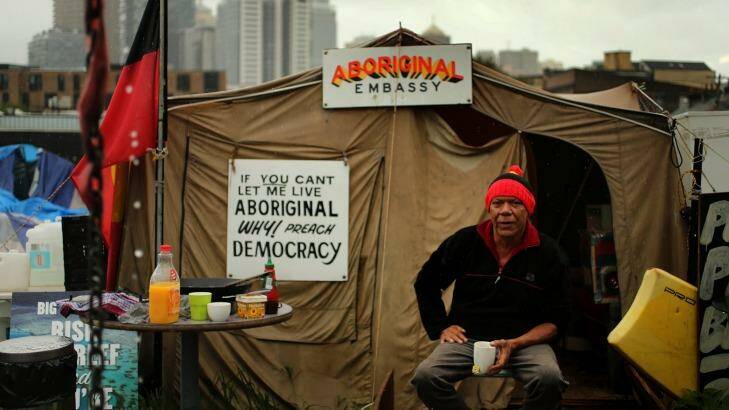 Christopher Tomlins, from Alice Springs, has his morning cup of tea at The Block Tent Embassy in Redfern, Sydney. Christopher is a member of the Freedom Summit for Alice Springs delegation and will remain at the sit-in until "something positive that comes out of this standoff". Photo: Kate Geraghty