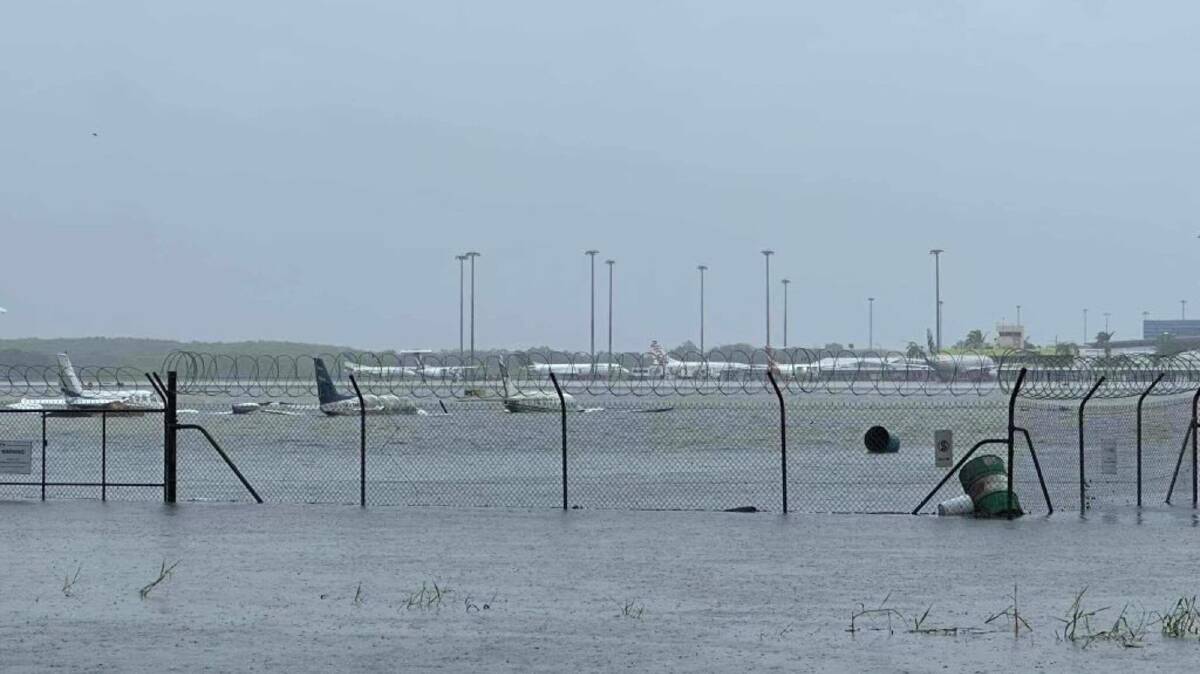 Planes sitting in floodwater at Cairns Airport on December 17. Picture via X/@AlboMP
