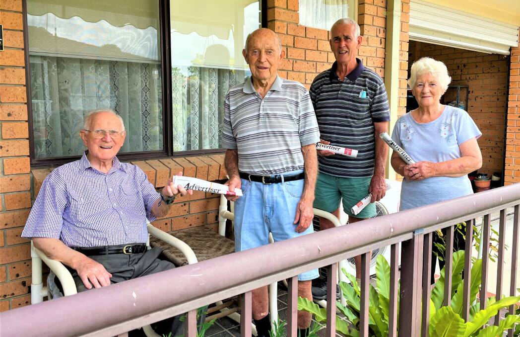 RFBI Cessnock Masonic Village resident Colin Adams receives his paper from Bob Dann, with fellow deliverers Dennis Moore and Sue Dann. 
