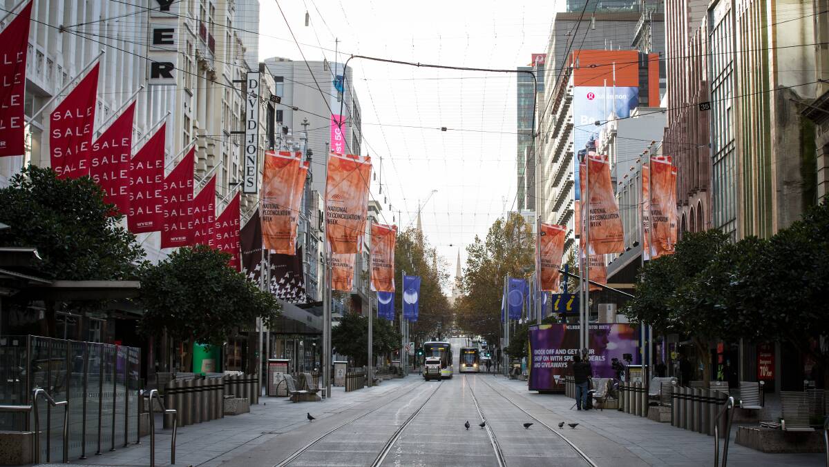 A normally busy Bourke Street Mall in Melbourne sits empty on Friday. Picture: Getty Images