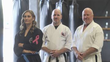 Anna De Nuntiis with masters Lincoln Harris and John Tooby from Toodakan Self Defence Academy at Smeaton Grange. Pictures: Simon Bennett