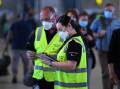 Biosecurity officers will step up the number of inquiries of passengers in airport baggage halls. (James Ross/AAP PHOTOS)