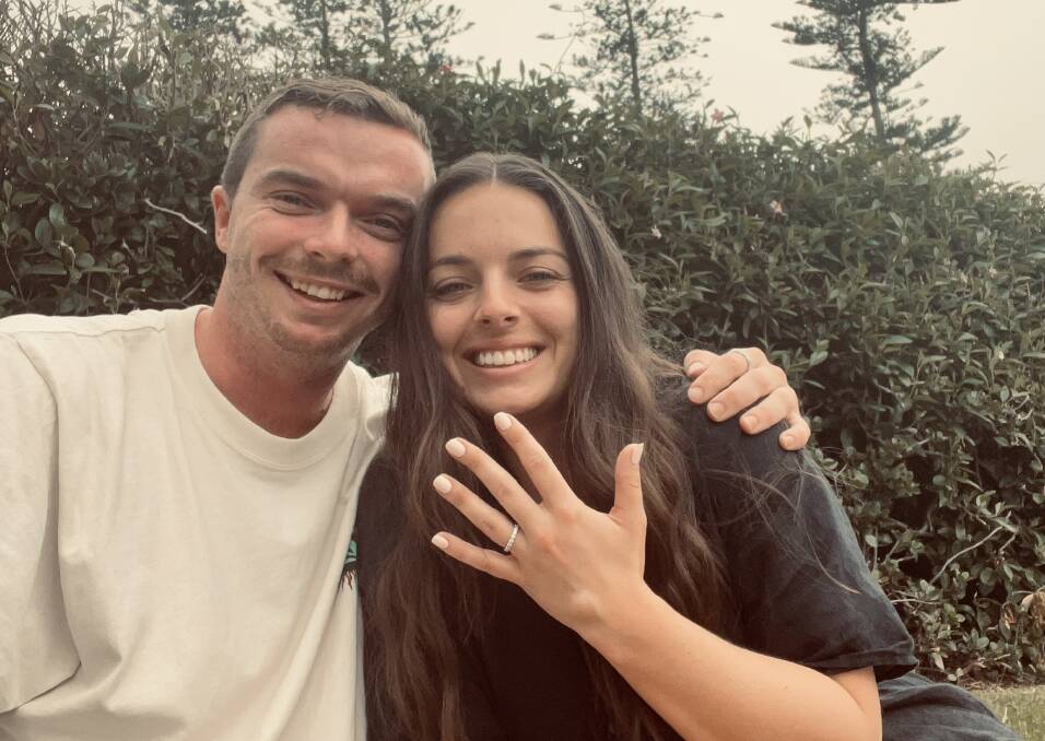 SHE SAID YES: Steele Harvey and Remy Spillane after their crossword engagement at King Edward Park on Saturday. Picture: supplied