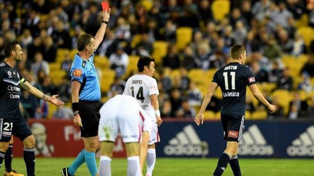 Turning point: Mitch Austin gets his marching orders in the 24th minute. Photo: AAP