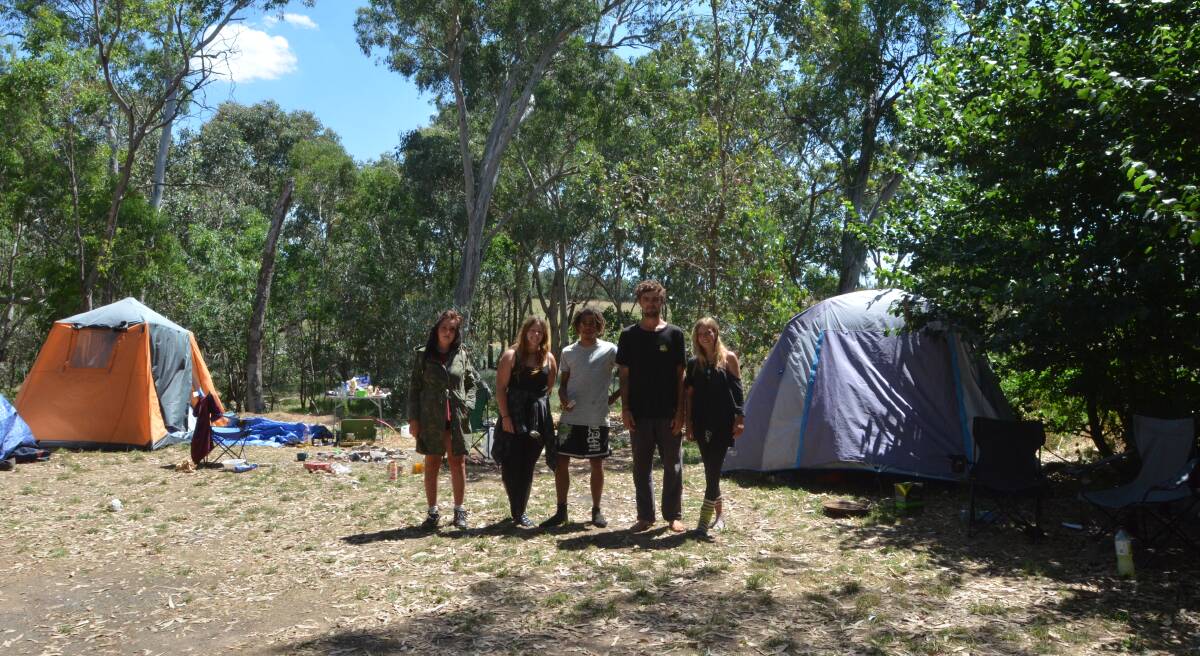 REST AREA: English backpackers, Rosa Davison, 
Jessica Hill, Jack Mantz, Alex Meek and Imogen Davison 
have set up camp at the Wombat Road rest stop.