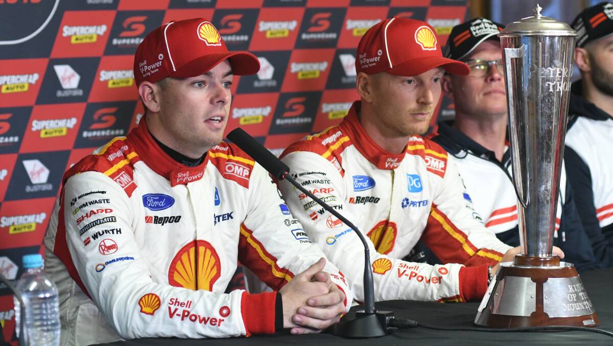 MORE TO COME: Scott McLaughlin and Alex Premat are celebrating their win but the team still have questions to answer. Photo: CHRIS SEABROOK 