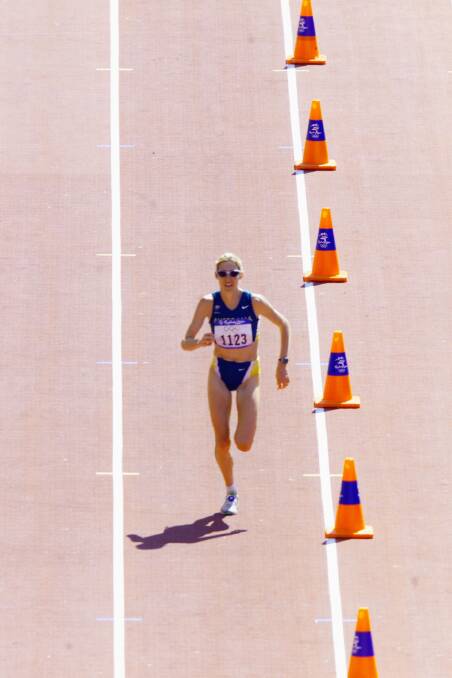 Gruelling effort: Kerryn McCann approaches the finish line of the marathon at the Sydney Olympics. Picture: Andy Zakeli.