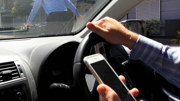AMA calls for tougher penalties for phone-toting drivers