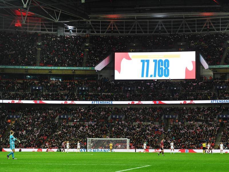 Wembley displays the crowd figure for the women's international between England and Germany.