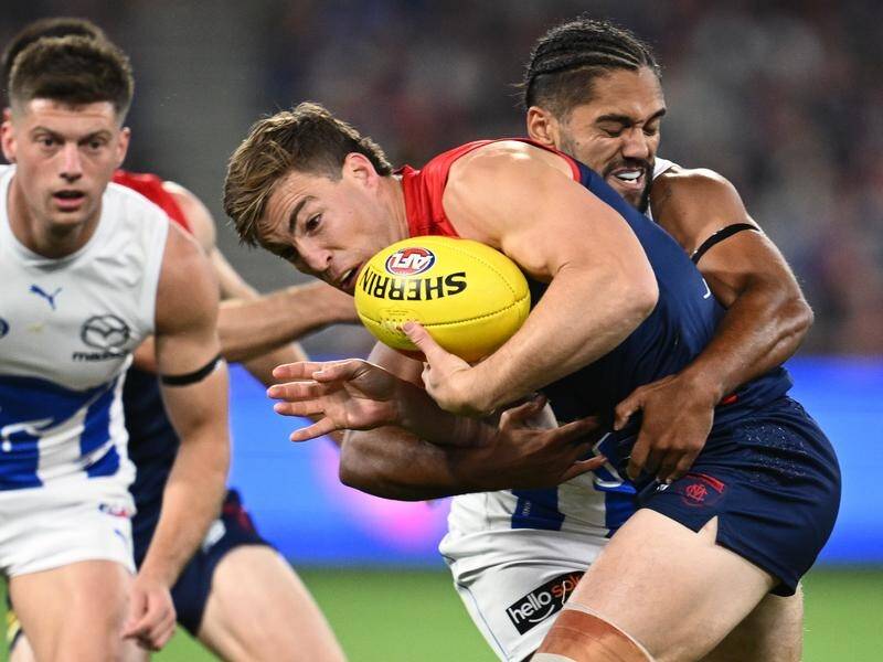 The ultra-competitive Jack Viney (centre) will play his 200th AFL game when the Dees take on Port. (Joel Carrett/AAP PHOTOS)
