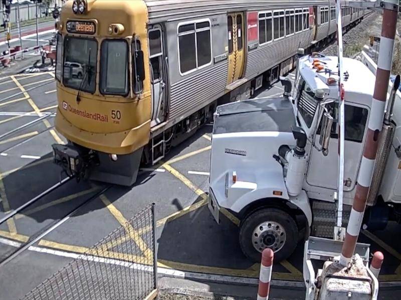 In one video clip, a truck became trapped under a boom gate as a train rushed by. (PR HANDOUT IMAGE PHOTO)