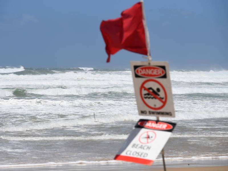 Surf Life Saving Queensland has closed 14 beaches as Tropical Cyclone Seth causes some wild weather.