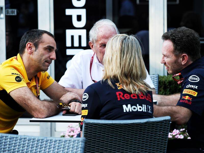 Some tense exchanges: Cyril Abiteboul (left) and Christian Horner (right).