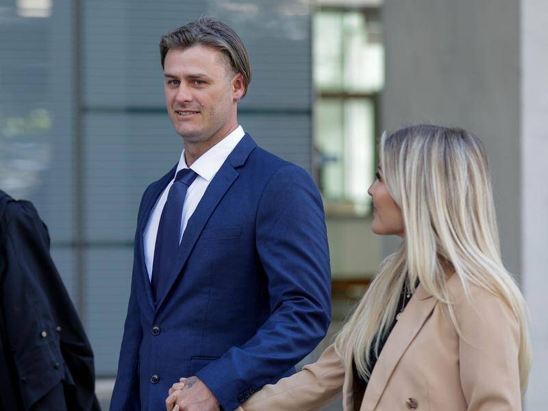 Christopher Jensen left court with fiancee Tayla Made, having been given a suspended sentence. (Russell Freeman/AAP PHOTOS)