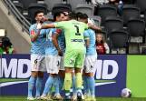 Melbourne City players celebrate Marin Jakolis's goal in their 2-1 win over Western Sydney. (Dan Himbrechts/AAP PHOTOS)