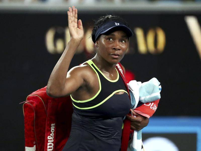 Venus Williams waves to the crowd in what could be her last Australian Open singles match.