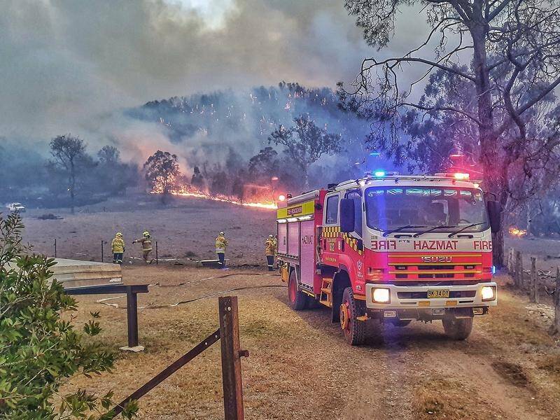 Fifty-seven fires were burning in NSW in the afternoon and about 20 weren't contained.
