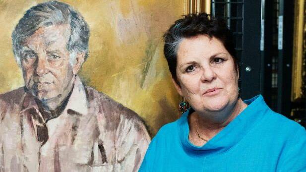 Daughter Melanie Bryan with the Judy Cassab portrait of her father, Morris West.  Photo: Christopher Pearce
