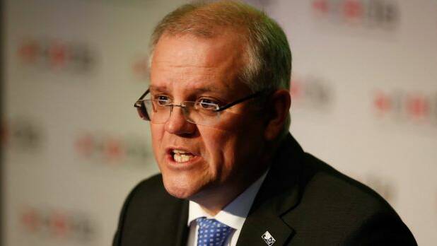 Treasurer Scott Morrison says the Australian Prudential Regulation Authority and the Australian Securities and Investment Commission are trying to take the heat out of the housing market. Photo: Alex Ellinghausen

