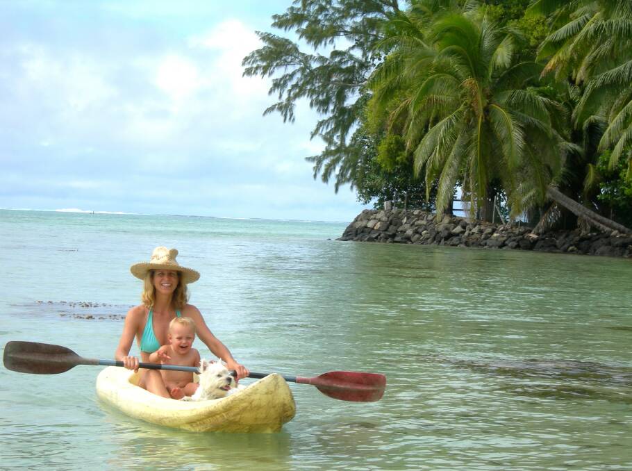 Kayaking in a lagoon in Mo'orea with Oliver.